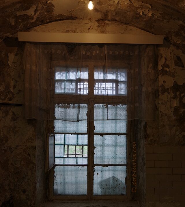 Patarei 07 - atmospheric prison window with net curtains